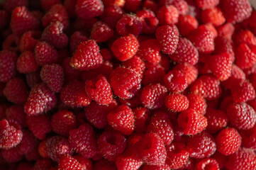 Fresh raspberries background. Healthy food organic nutrition. Top view from above