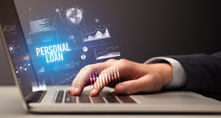 Businessman working on laptop, business concept