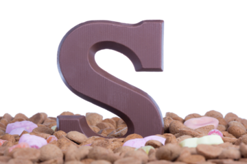 Ginger nuts with chocolate letter S at Dutch children's event Sinterklaas
