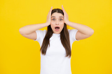 Surprised astonished young woman with open mouth. Portrait of excited amazed gasping girl. Expressive facial expressions.