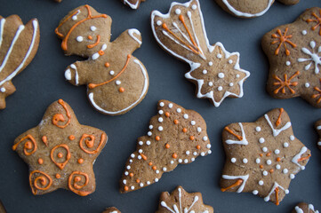 Set of different homemade Christmas cookies isolated on background, close up view with copy space for text. New year frame with tasty gingerbread cookies with spices. Winter holiday concept