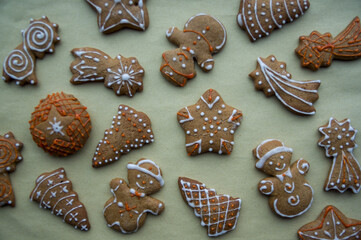 Set of different homemade Christmas cookies isolated on background, close up view with copy space for text. New year frame with tasty gingerbread cookies with spices. Winter holiday concept