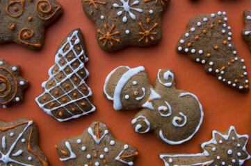 Set of different homemade Christmas cookies isolated on background, close up view with copy space for text. New year frame with tasty gingerbread cookies with spices. Winter holiday concept