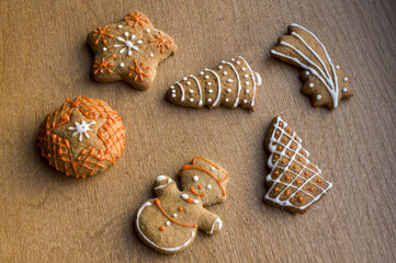 Set of different homemade Christmas cookies isolated on background, close up view with copy space for text. New year frame with tasty gingerbread cookies with spices. Winter holiday concept