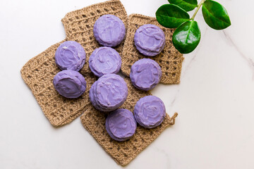 Lavender handmade soap on washcloth background. Free space for text. Decorative cosmetics.