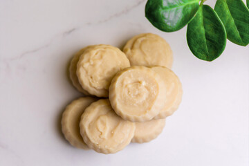 Handmade soap laid out on a marble background. Natural cosmetics for body care.