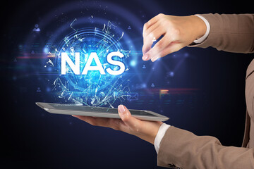 Close-up of a touchscreen with abbreviation.