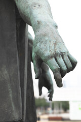 Hands of the sculpture. Hand of the statue. 