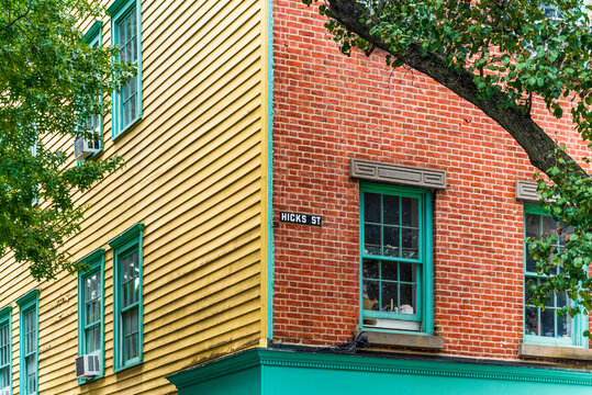 Texture of yellow and red colorful building exteriors in Hicks Street, Brooklyn Heights, New York City, USA