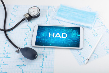 Close-up view of a tablet pc with medical abbreviation