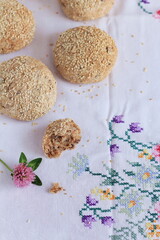 Wholemeal flour rolls / wheat bread with sesame, homemade pastries for breakfast, healthy meal, healthy diet concept, culinary magazine, food book.
