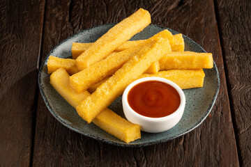 Homemade fried polenta on the table.