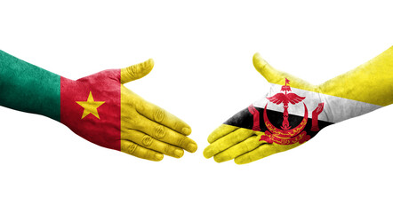 Handshake between Brunei and Cameroon flags painted on hands, isolated transparent image.