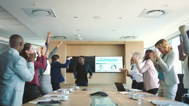 Success, celebration and business people in meeting to celebrate global company mission with clapping hands and high five at work. Corporate workers happy after achievement with support in conference