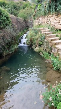 a stream next to waterfall #1 in Tobera village, municipality of Fr&iacute;as, province of Burgos, Spain