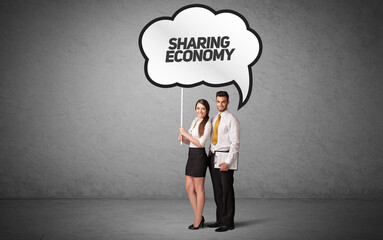 business person in casual holding road sign