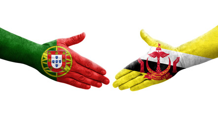 Handshake between Brunei and Portugal flags painted on hands, isolated transparent image.