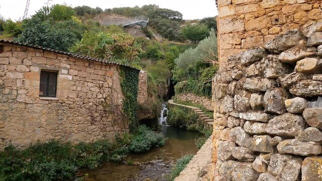 path along the Molinar river going to waterfall #1 in Tobera village, municipality of Fr&iacute;as, province of Burgos, Castile and Le&oacute;n, Spain