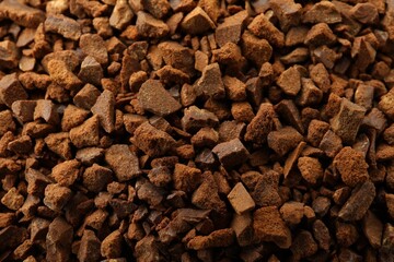 Pile of chicory granules as background, closeup