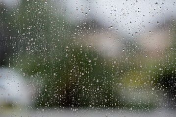 water on mirror, rainy day, abstract background