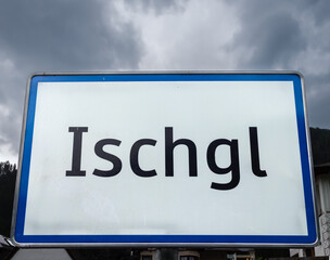 Signboard of Ischgl, a town in the Paznaun valley in the Austrian state of Tyrol. Its ski resort is connected with that of Samnaun across the border in Switzerland .