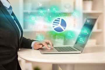 Businessman working on laptop with new business