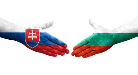 Handshake between Bulgaria and Slovakia flags painted on hands, isolated transparent image.