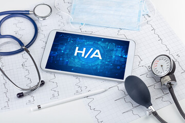 Close-up view of a tablet pc with medical abbreviation concept