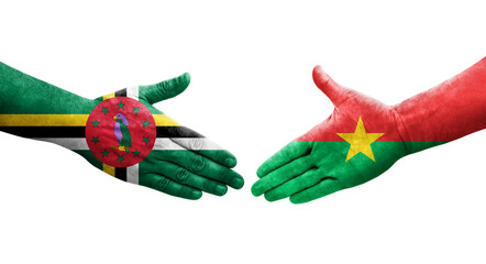 Handshake between Burkina Faso and Dominica flags painted on hands, isolated transparent image.