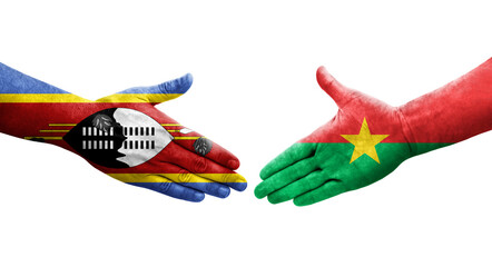 Handshake between Burkina Faso and Eswatini flags painted on hands, isolated transparent image.