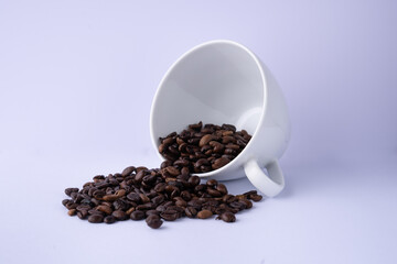 coffee beans in a cup isolated with white background