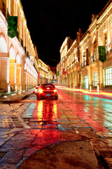 strees of historical downtown with golden lights and light painting in zacatecas 