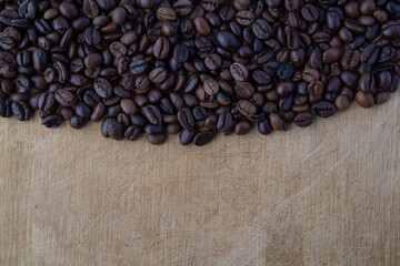 coffee beans on wooden background