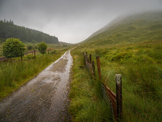path in the mountains with cloudy weather