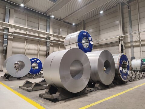 Stored coils with steel sheets in the factory for pressing