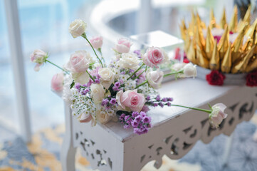 Wedding decoration with multi colors flowers and modern design table setting. Intimacy wedding ceremony or party indoors. 