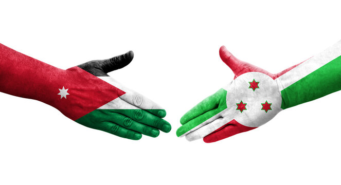 Handshake between Burundi and Jordan flags painted on hands, isolated transparent image.