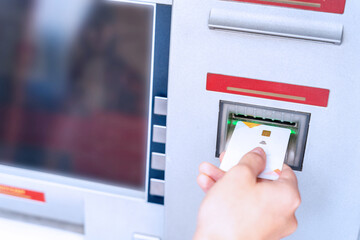 Atm machine cash. Money bank credit card holding hand. Withdraw money cash from atm. Bank credit card withdraw dollar bill.