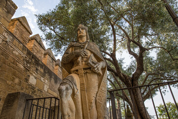 stone statue of a templar knight in cordoba, spain