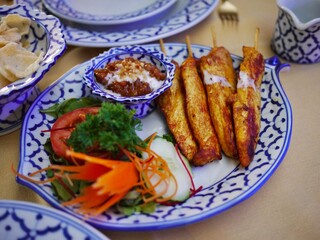 Thai grilled wings with vegetables
