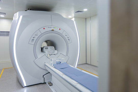 Magnetic resonance imaging scan or MRI machine device in hospital.
