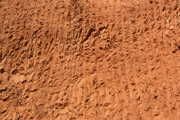 Cross-sectional mechanical indentation background texture of earth hill