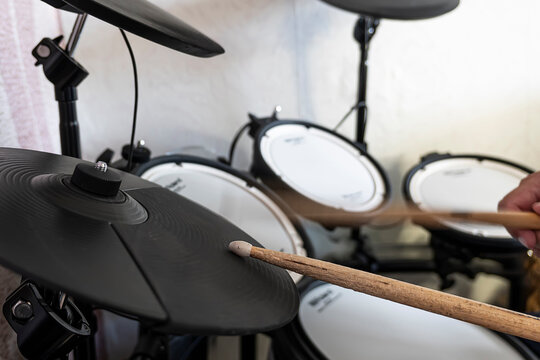 Musician equipment. close up of a modern black electronic drum or e-drum. Modern audio instrument abstract.