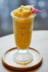 passion fruit smoothie , smoothie or lemon and passion fruit smoothie with lemon topping