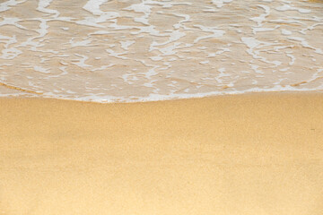Fototapeta na wymiar waves on the sand