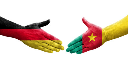 Handshake between Cameroon and Germany flags painted on hands, isolated transparent image.