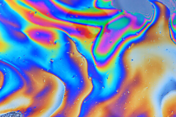 multicolored spot gasoline abstract background, abstract oil spill on water