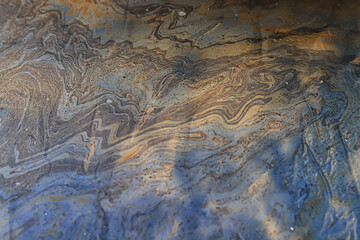 multicolored spot gasoline abstract background, abstract oil spill on water