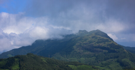 Munnar, the famed hill station of south India, is a romantic locale where natural beauty is everywhere to visit, explore and enjoy. Munnar is situated at the confluence of three mountain streams.