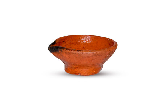 Indian clay oil lamp or diya used for Diwali and festival celebration with white background